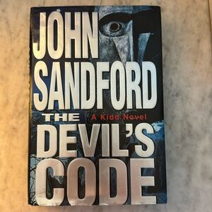 John Sandford. The devils code.  Hardback